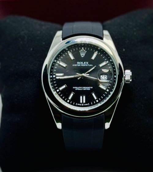 Rolex Oyster Perpetual or Rolex Datejust.